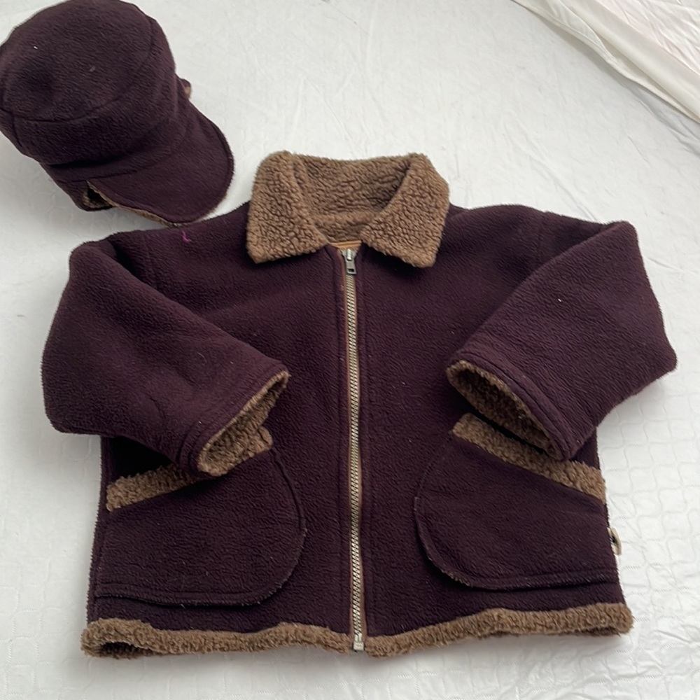 Corky and Company brown fleece jacket and hat